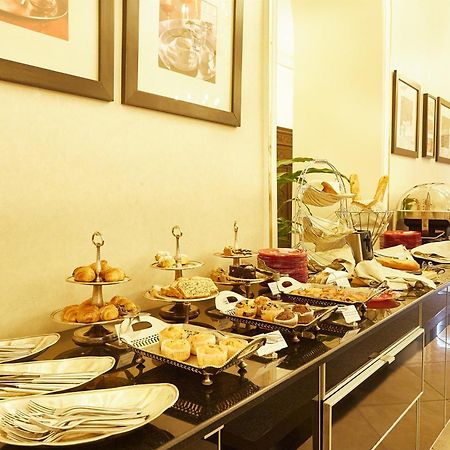 Grand Hotel Continental Bucuresti Exterior foto A buffet at a hotel