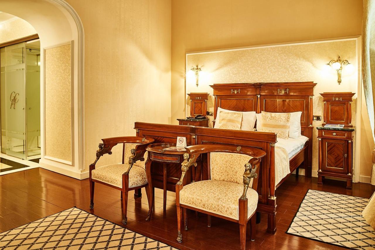 Grand Hotel Continental Bucuresti Exterior foto A bedroom at the hotel