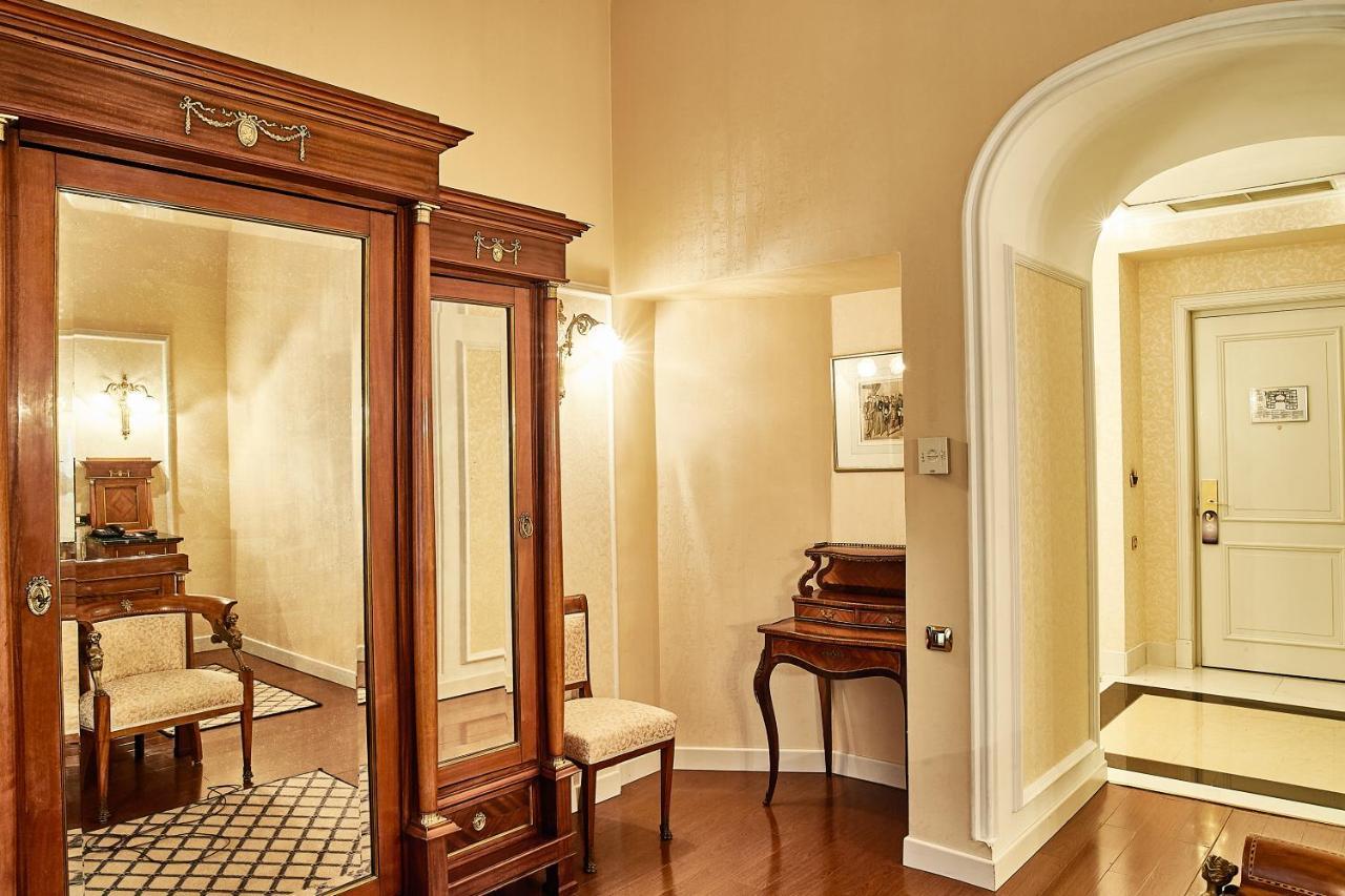 Grand Hotel Continental Bucuresti Exterior foto A mirror in a home