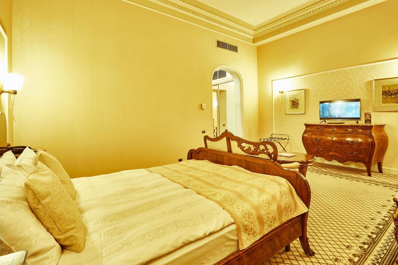 Grand Hotel Continental Bucuresti Exterior foto A bedroom at the Imperial